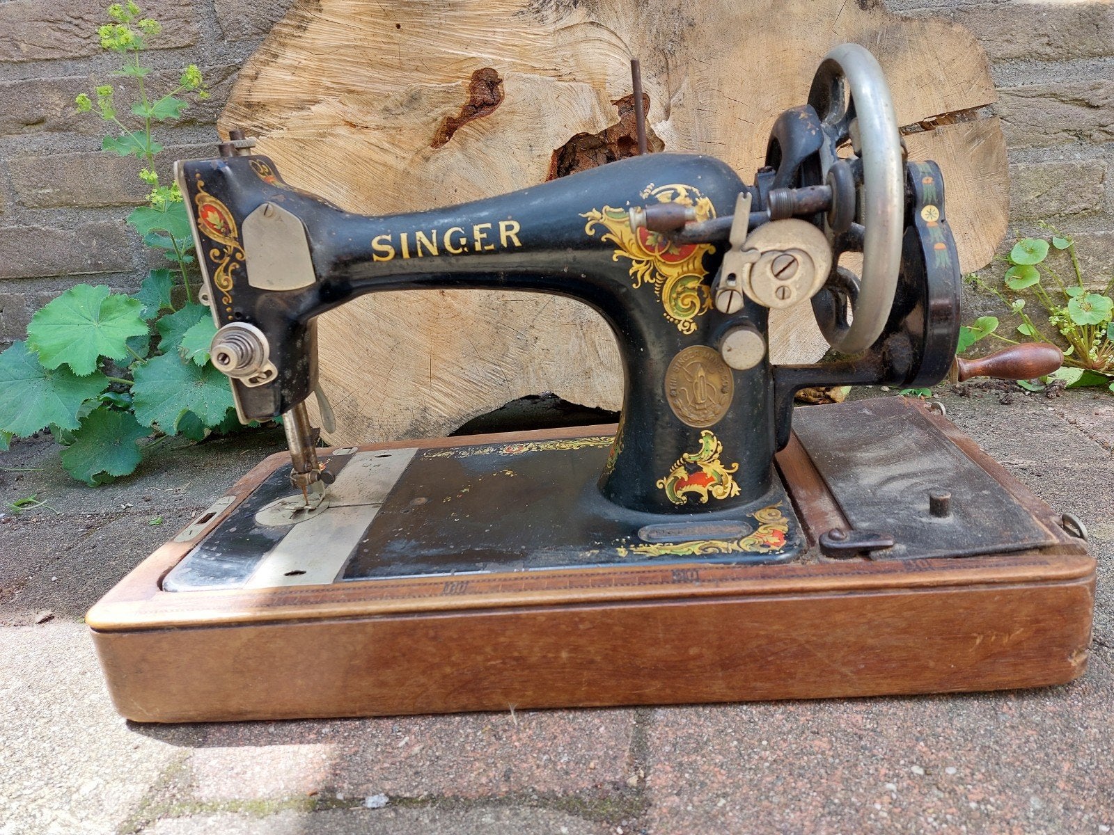 Singer handnaaimachine., Ophalen