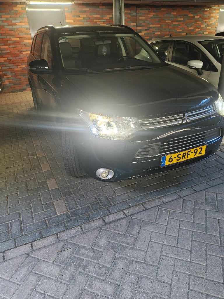 Mitsubishi Outlander 2.0 Dohc Mivec Phev 203pk 4WD CVT 5P, Auto's, Mitsubishi, 1998 cc, Outlander, 4 cilinders, Zwart