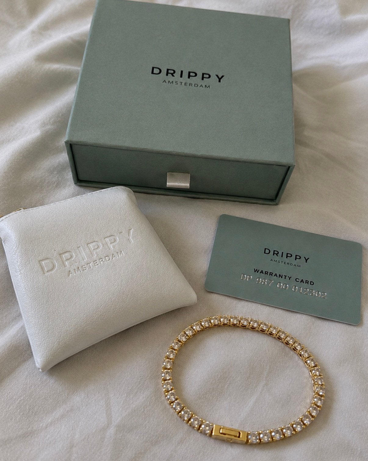 Drippy Amsterdam Tennisboy Bracelet 5mm Gold, Ophalen of Verzenden, Zo goed als nieuw, Goud, Met strass