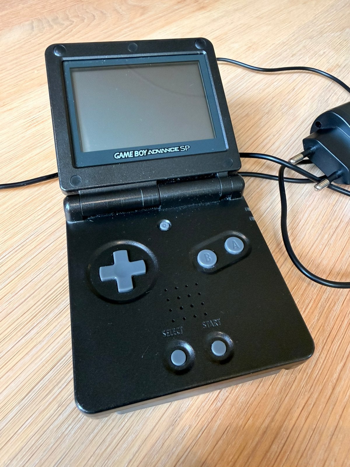 Nintendo Game Boy Advance SP Zwart  + oplader, Spelcomputers en Games, Spelcomputers | Nintendo Game Boy, Ophalen of Verzenden