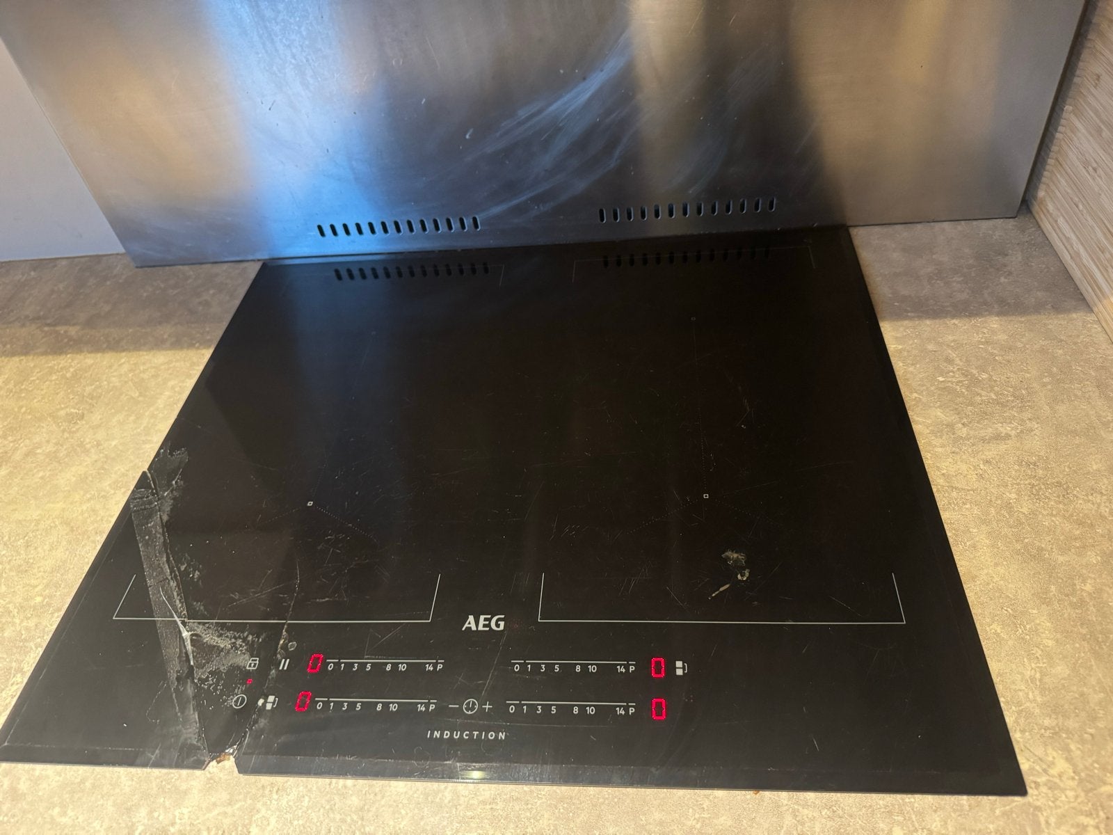 AEG Inductie kookplaat 590x520 met barst (werkt nog), Ophalen, Gebruikt, 4 kookzones, Inbouw