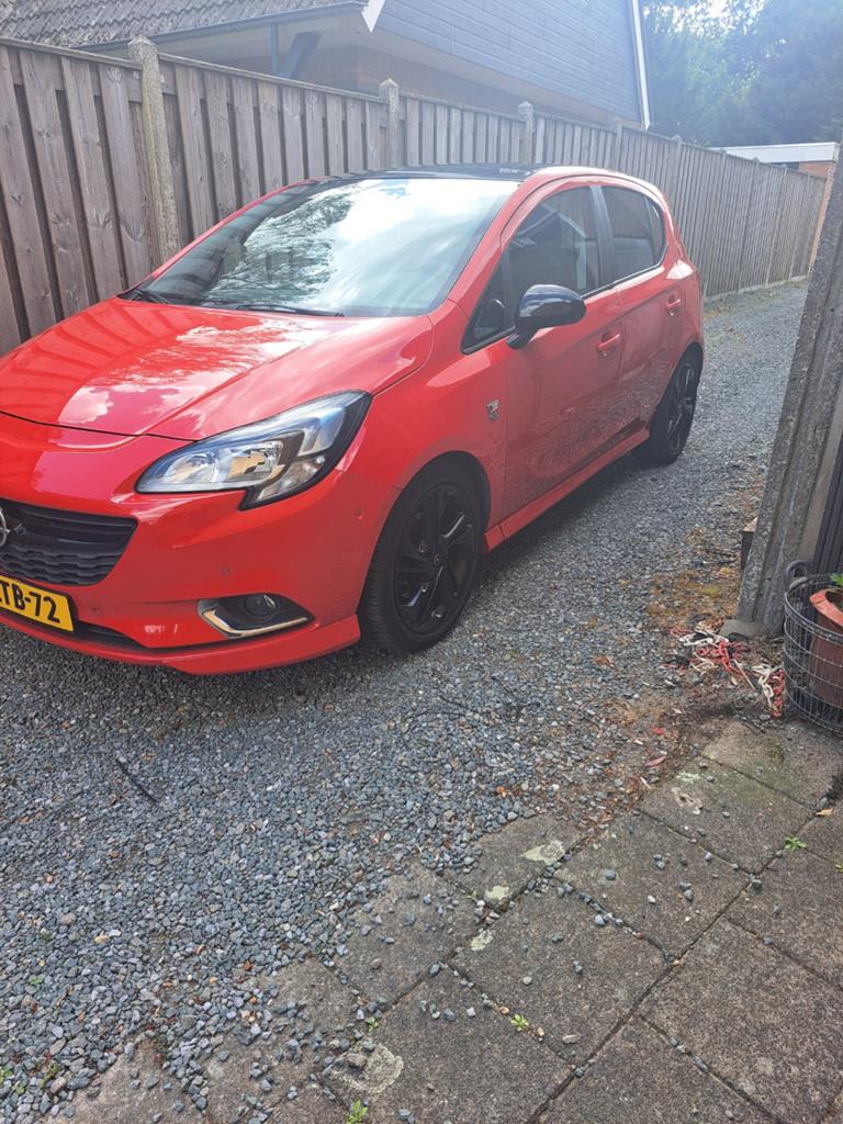 Opel Corsa 1.0T 85KW/115PK 5D 2015 Rood, Auto's, Voorwielaandrijving, 49 €/maand, Origineel Nederlands, 1200 kg