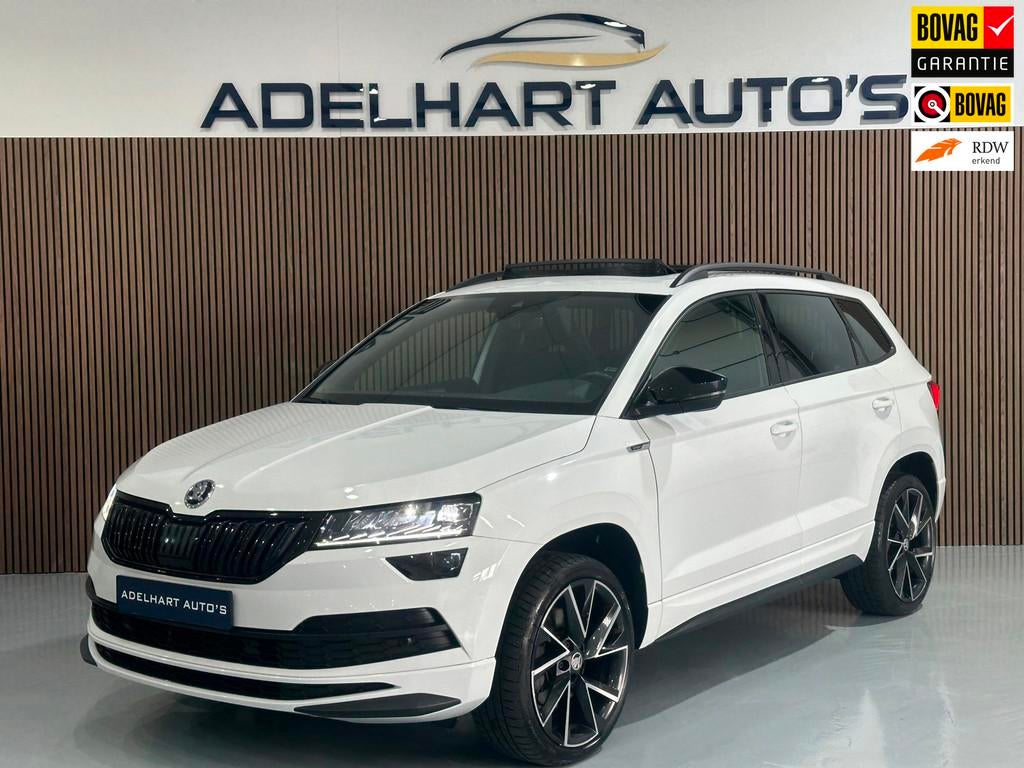 Skoda Karoq 1.5 TSI ACT Sportline Automaat / Panorama dak /, 1295 kg, 4 cilinders, 150 pk, Wit