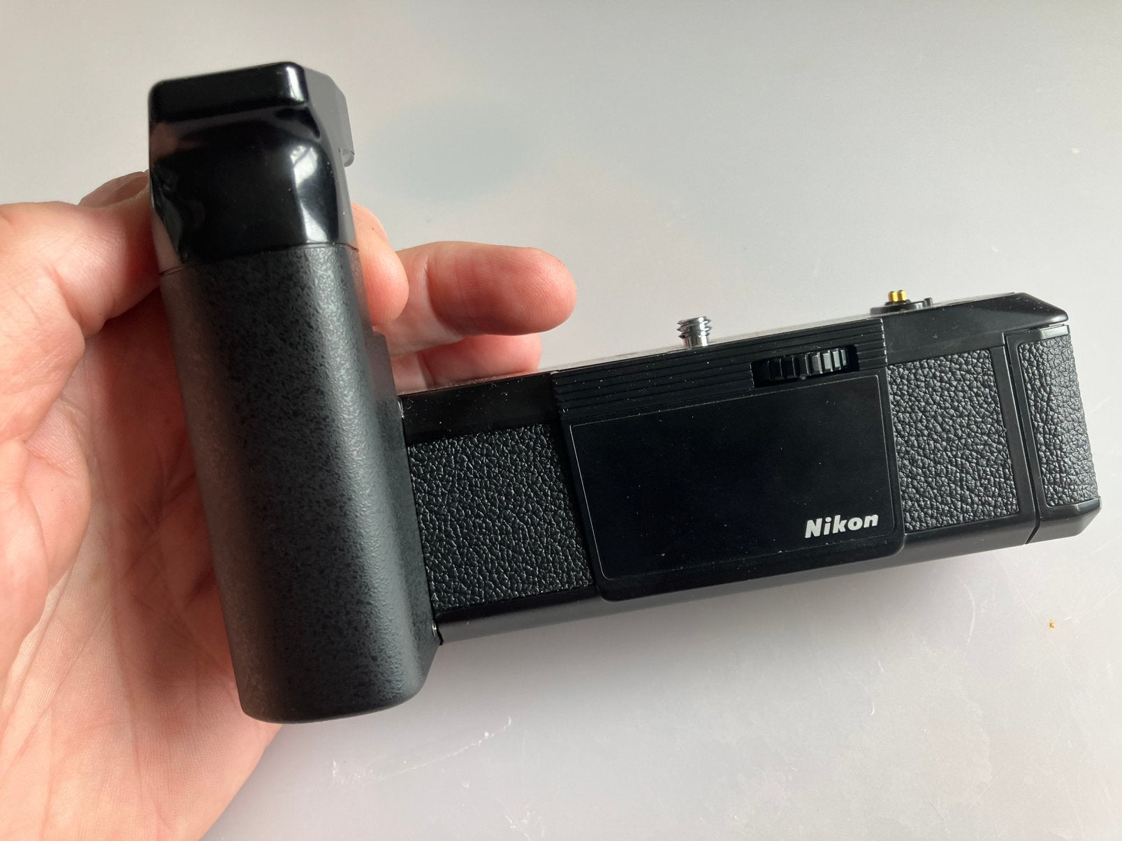 Nikon MD-14 winder, Audio, Tv en Foto, Fotocamera's Analoog, Ophalen of Verzenden, Zo goed als nieuw, Spiegelreflex, Nikon