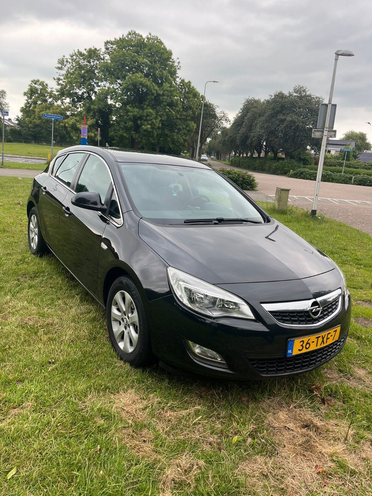 Opel Astra 1.4 Turbo 88KW 5D 2012 Zwart, Voorwielaandrijving, Stof, Navigatiesysteem, 4 cilinders