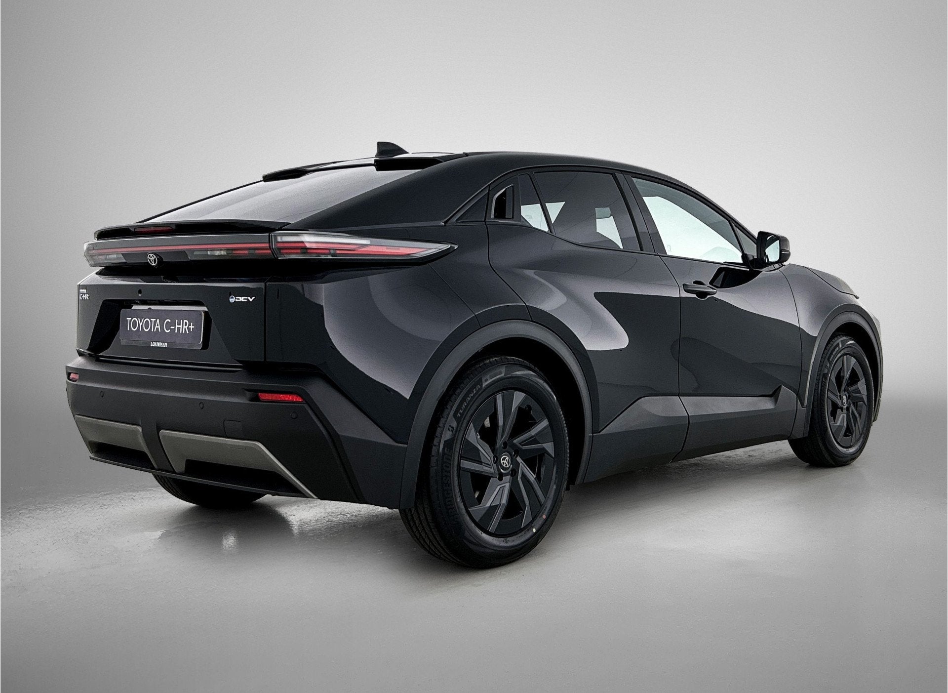 Toyota C-HR+ First Edition 77 kWh EV-Deal |Stoel en stuurwie, Auto's, Stof, Gebruikt, 24 min, Zwart
