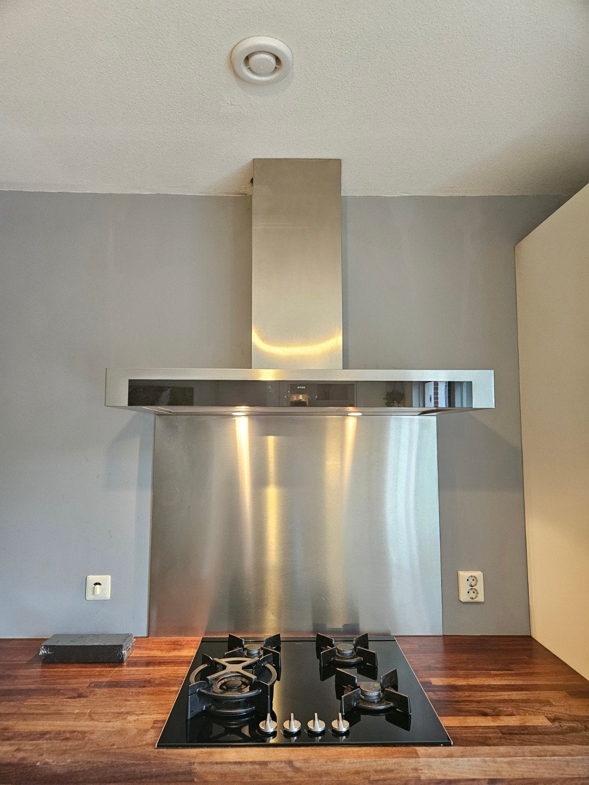 ATAG gaskookplaat inclusief ATAG afzuigkap en RVS achterwand, Huis en Inrichting, Ophalen, Gebruikt, 50 tot 100 cm, Minder dan 100 cm
