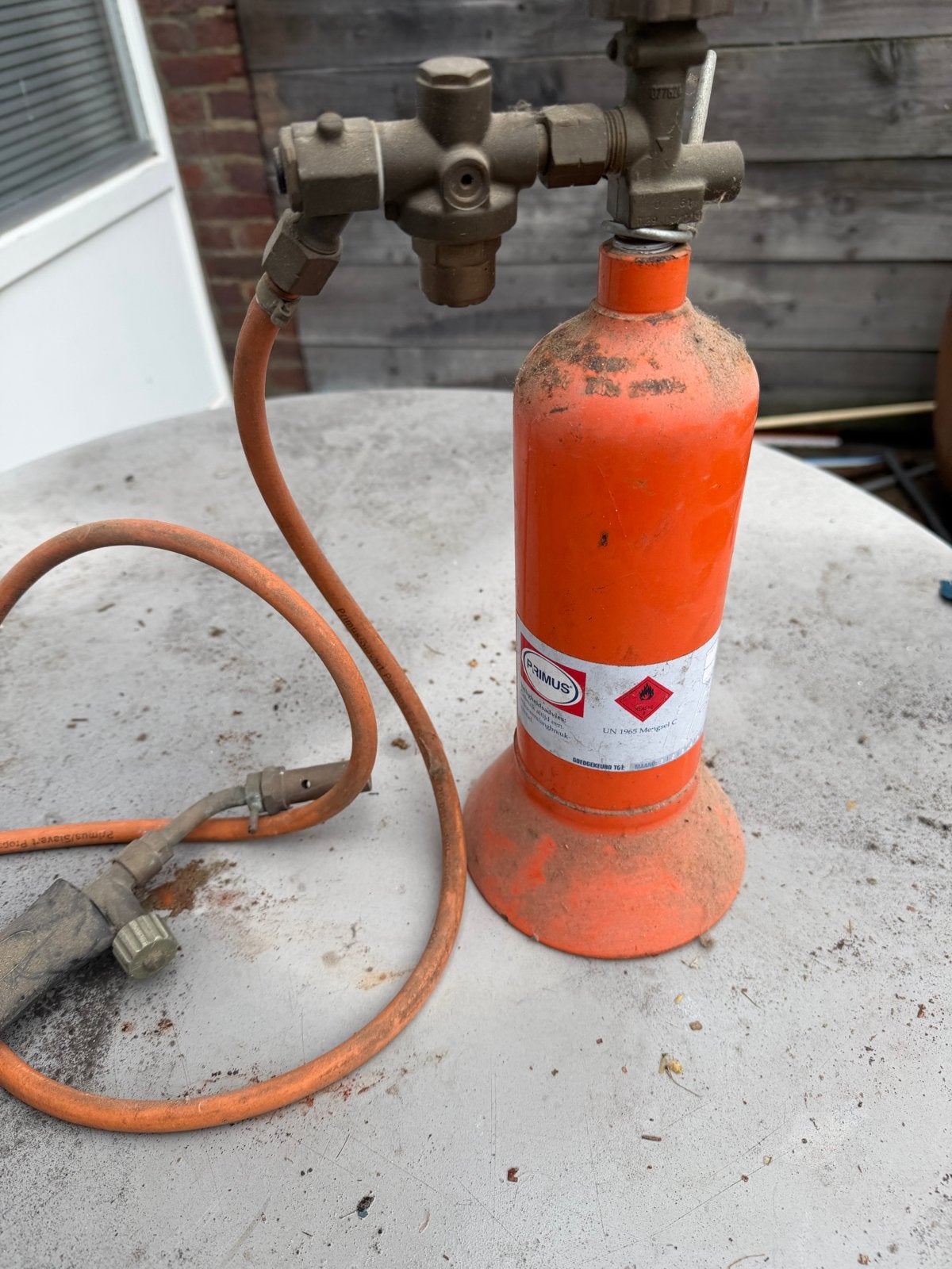 Primus gasbrander met slang en drukregelaar, Ophalen of Verzenden, Gebruikt