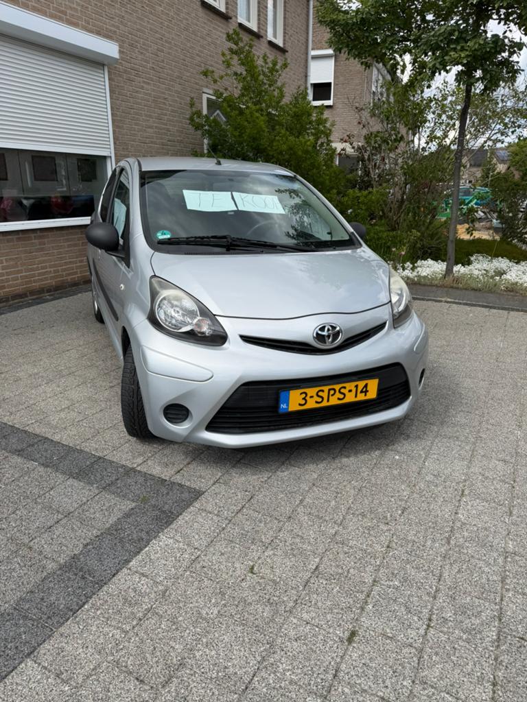 Toyota Aygo 59.303km 1.0 12V Vvt-i 5DRS 2013 Grijs, Auto's, Toyota, Voorwielaandrijving, Stof, Zwart, 4 stoelen