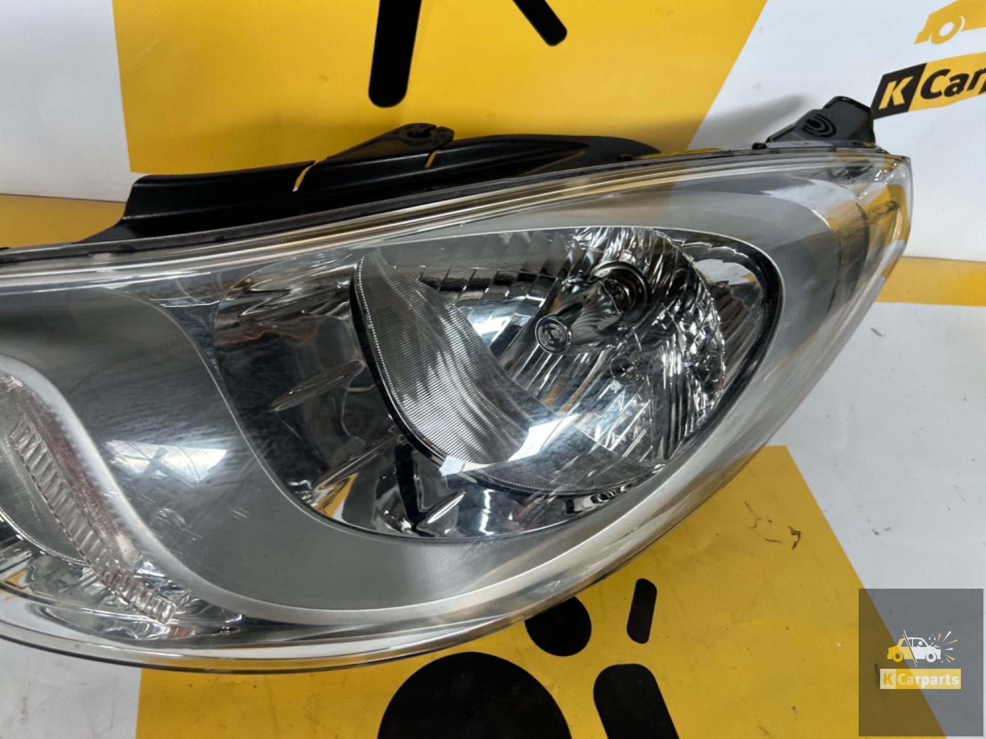 Hyundai i10 links voor koplamp origineel LHD13002 koplamp, Info@fabrikant.eu, Fabrikantstraat 1
1000 AA  Amsterdam, NL, Ophalen of Verzenden