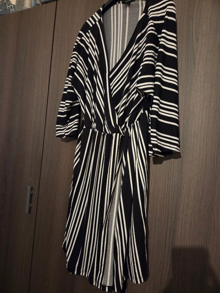 Jurk middel stretch dames L, Kleding | Dames, Jurken, Ophalen of Verzenden, Zo goed als nieuw, Maat 42/44 (L), Knielengte