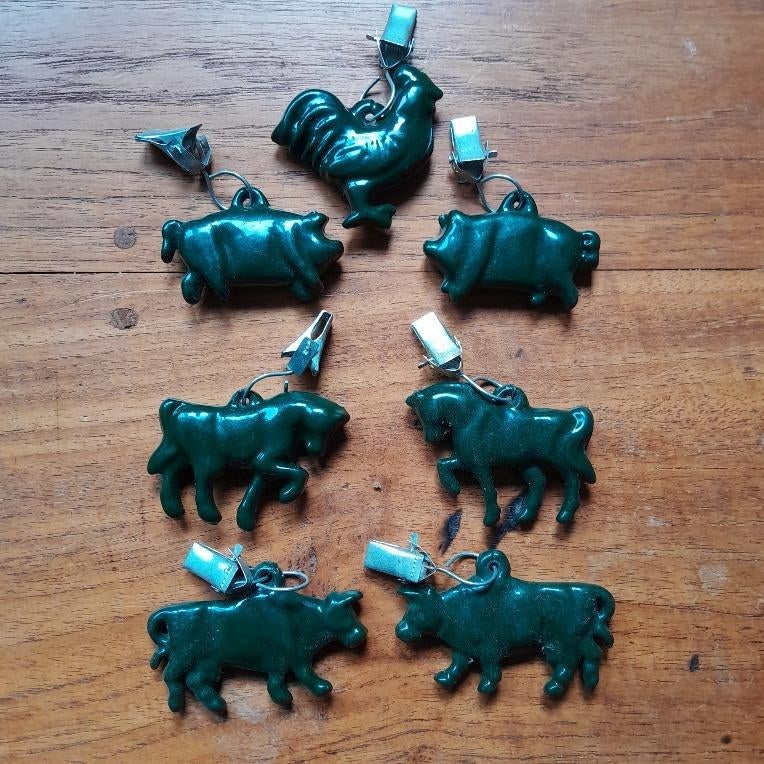Groene metalen gewichtjes om tafelkleed strak te houden., Tuin en Terras, Tuinmeubel-accessoires, Ophalen of Verzenden, Gebruikt
