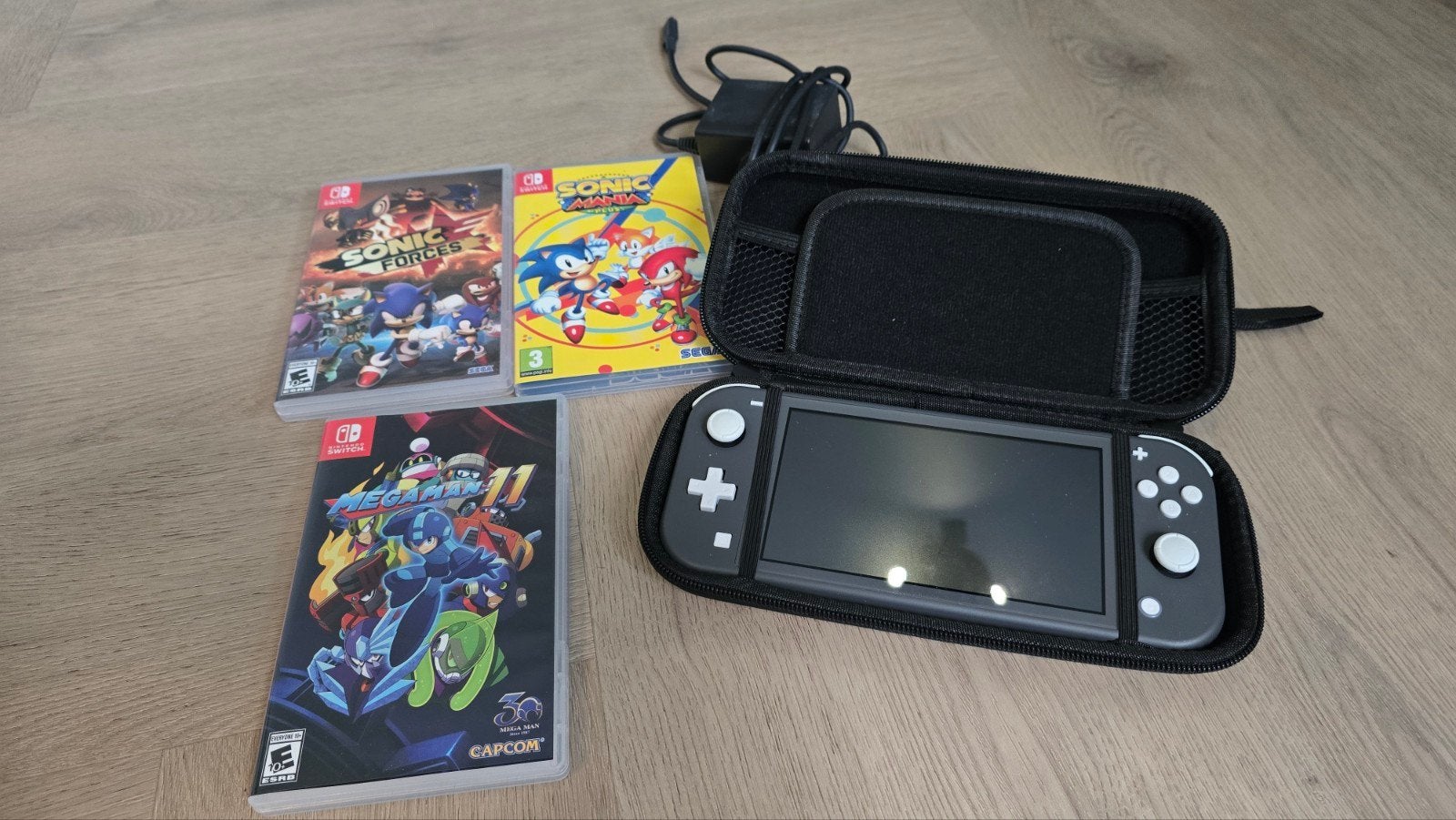 Nintendo Switch Lite met 3 games en hoesje, Spelcomputers en Games, Ophalen, Met games, Zo goed als nieuw, Switch Original