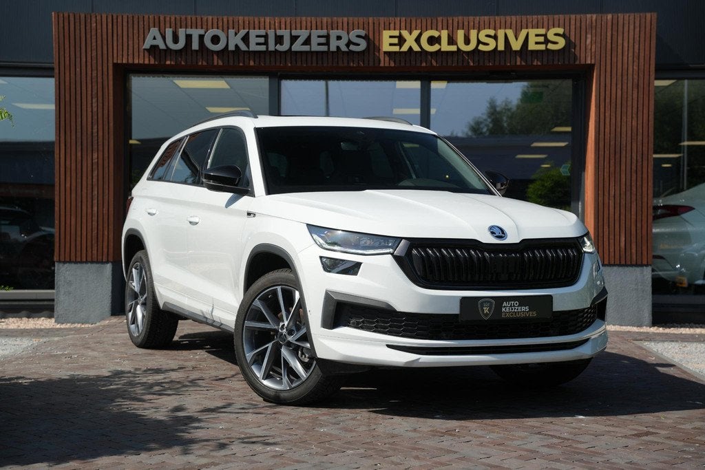 Skoda Kodiaq 1.5 TSI MHEV Sportline Business 7p, Auto's, Skoda, 4 cilinders, 150 pk, 7 stoelen, Wit