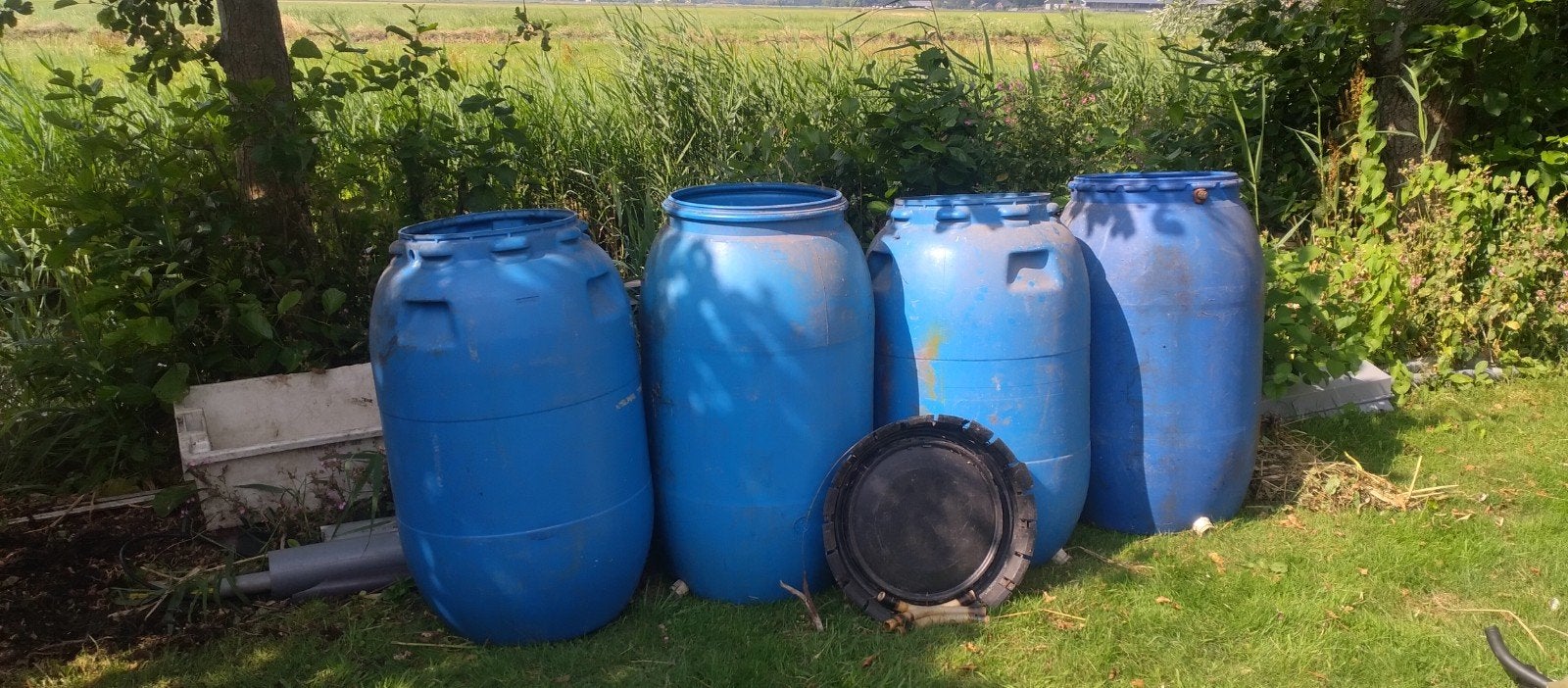 Blauwe kunststof 200 litervaten voor wateropslag of regenton, Tuin en Terras, 150 liter of meer, Ophalen, Gebruikt, Kunststof