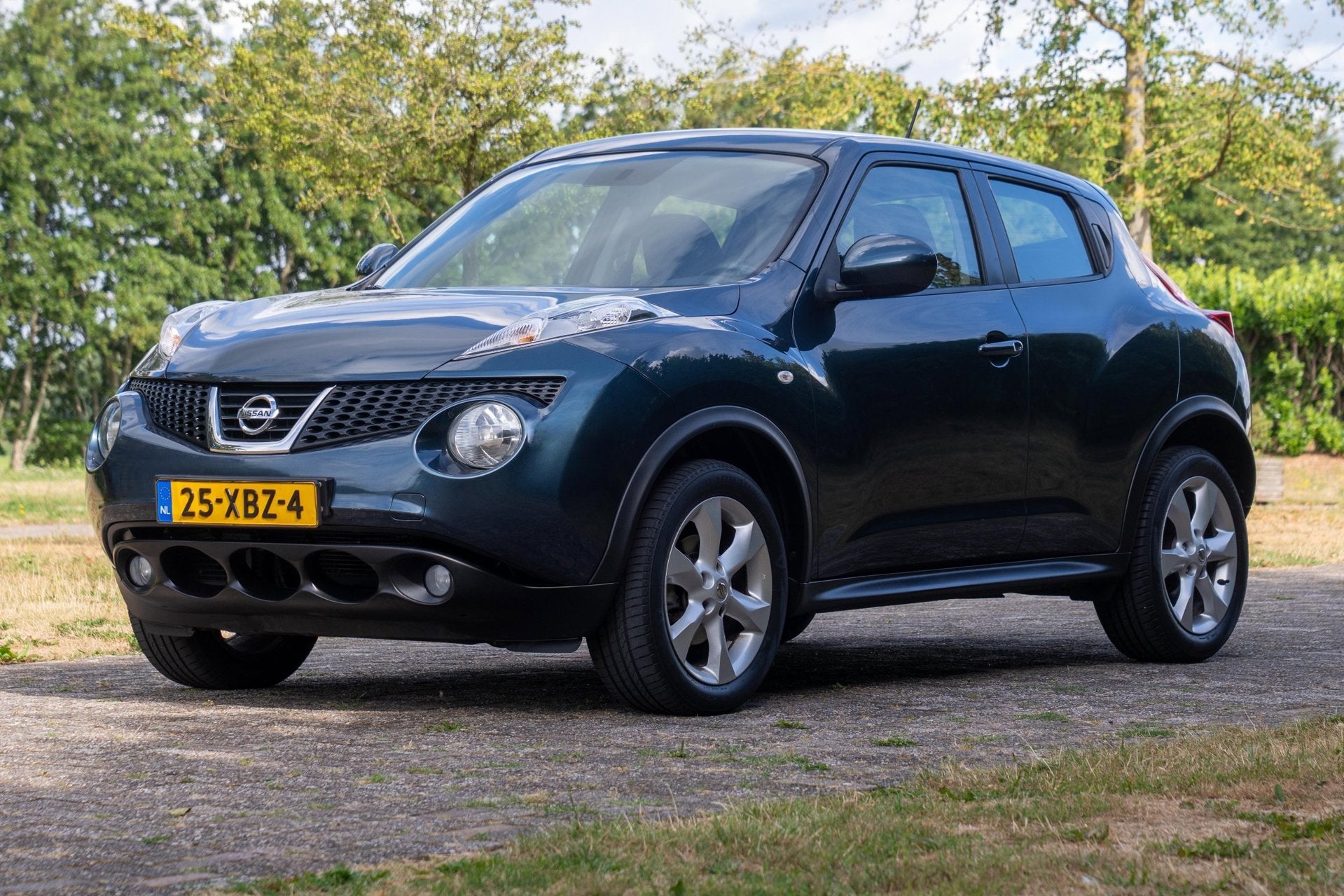 Nissan Juke 1.6 Acenta Automaat 2e Eigenaar +NAP NL-auto, Auto's, Nissan, Euro 5, Stof, Zwart, 4 cilinders