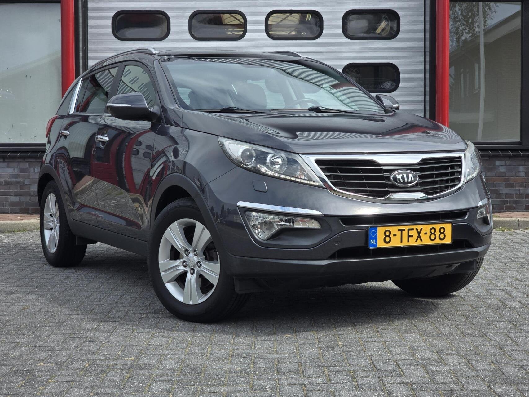 Kia Sportage 1.6 GDI X-ecutive Plus Pack Navi/Pano/Xenon/PDC, Auto's, Voorwielaandrijving, Euro 5, 4 cilinders, Met garantie (alle)