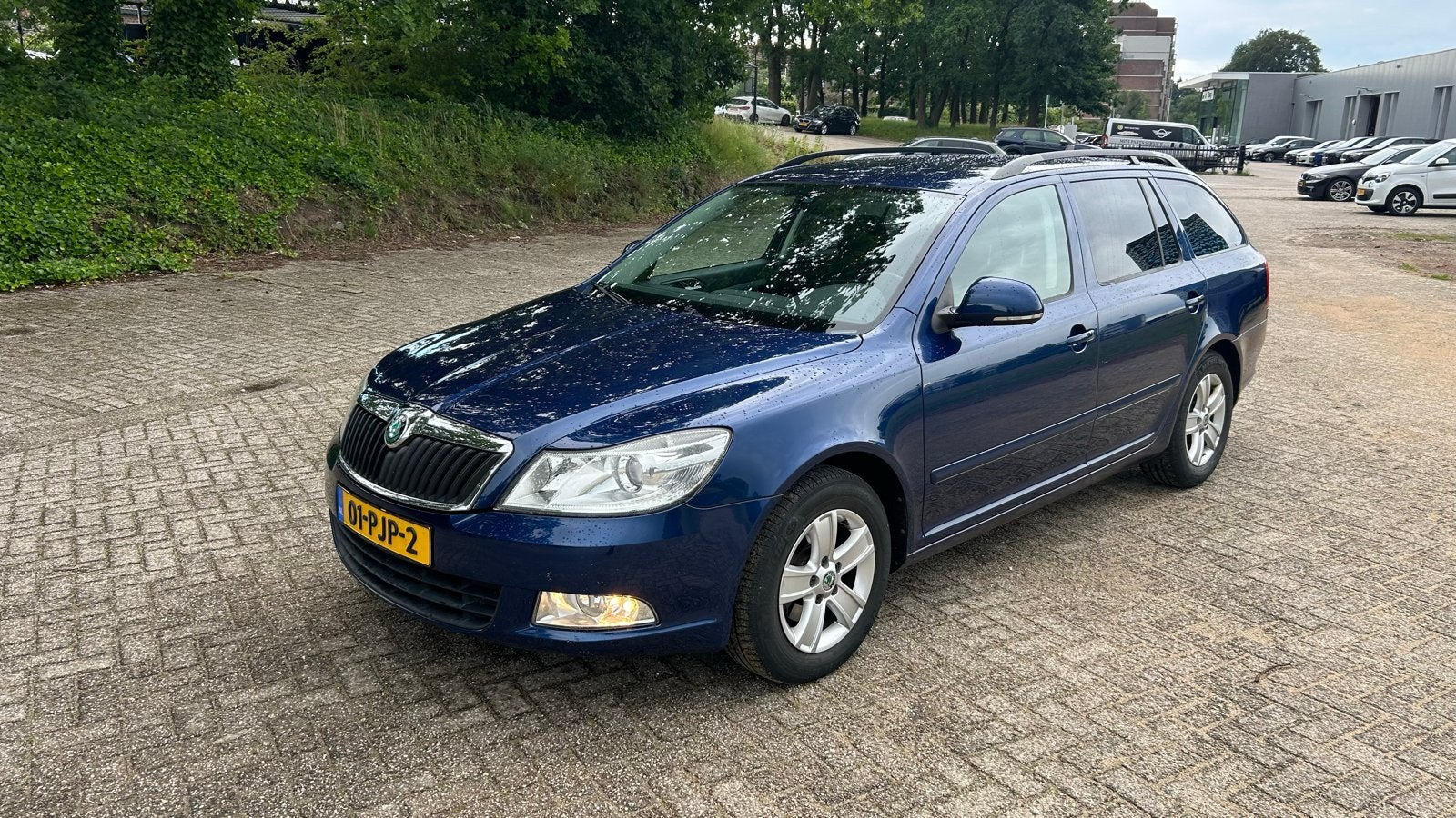 Skoda Octavia met 12 maanden APK 1.6 TDI 77KW Combi, Voorwielaandrijving, Beige, 4 cilinders, Blauw