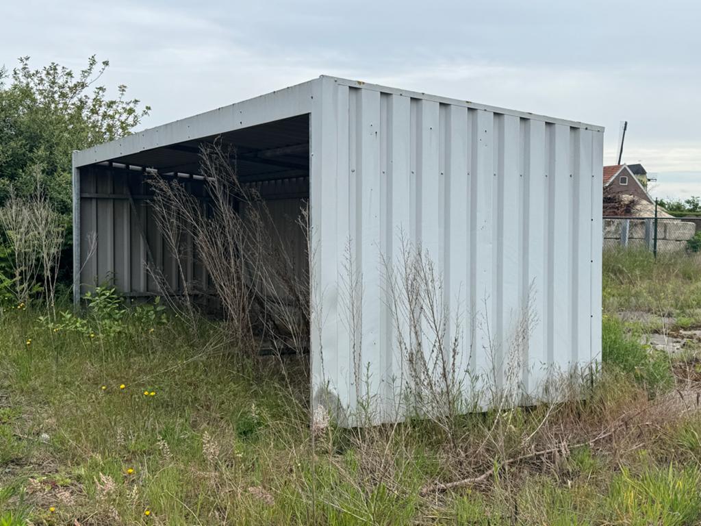 Fietsenstalling. Metalen opslagruimte / afdak, Ophalen