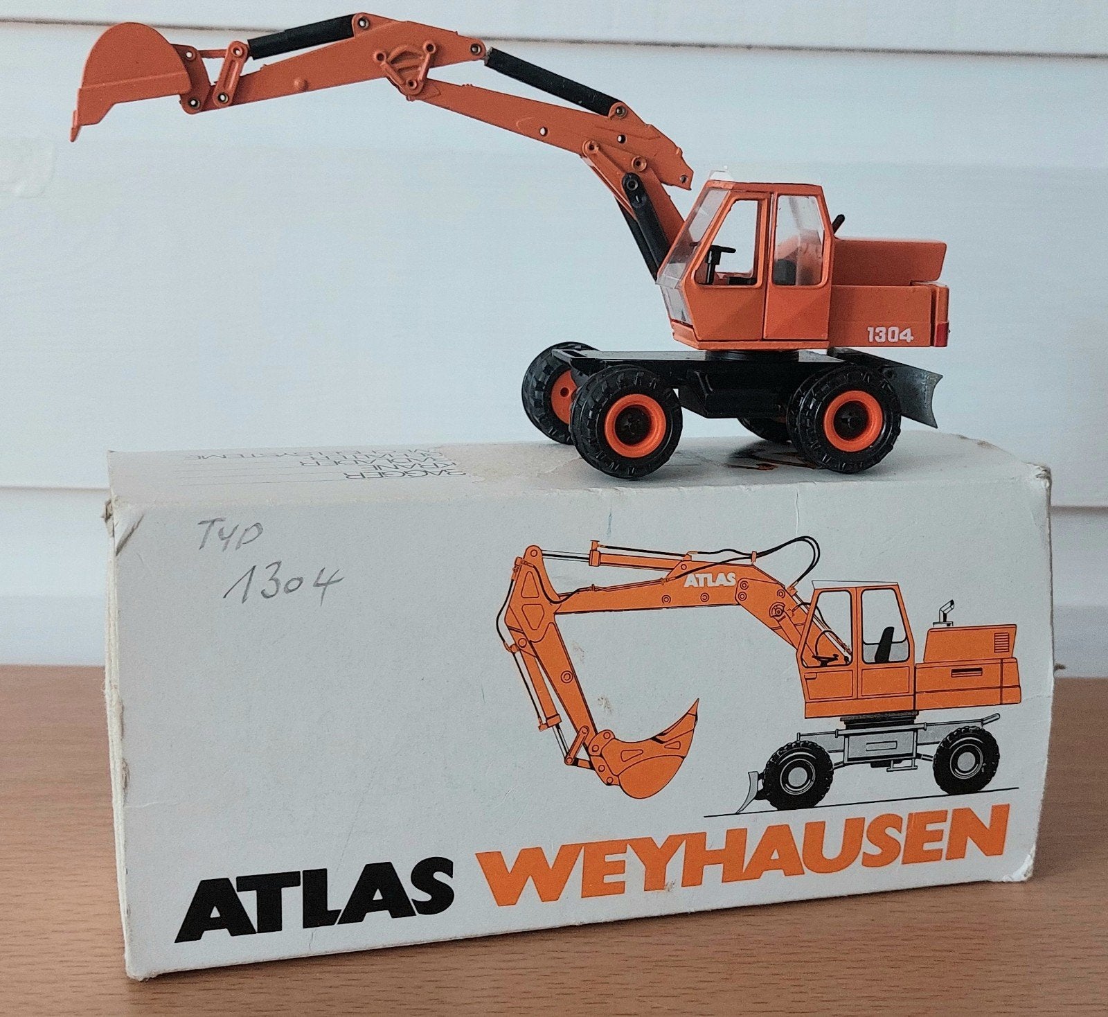 Atlas 1304 mobiele graafmachine - Conrad schaal 1:50, Ophalen of Verzenden, Zo goed als nieuw, Hijskraan, Tractor of Landbouw