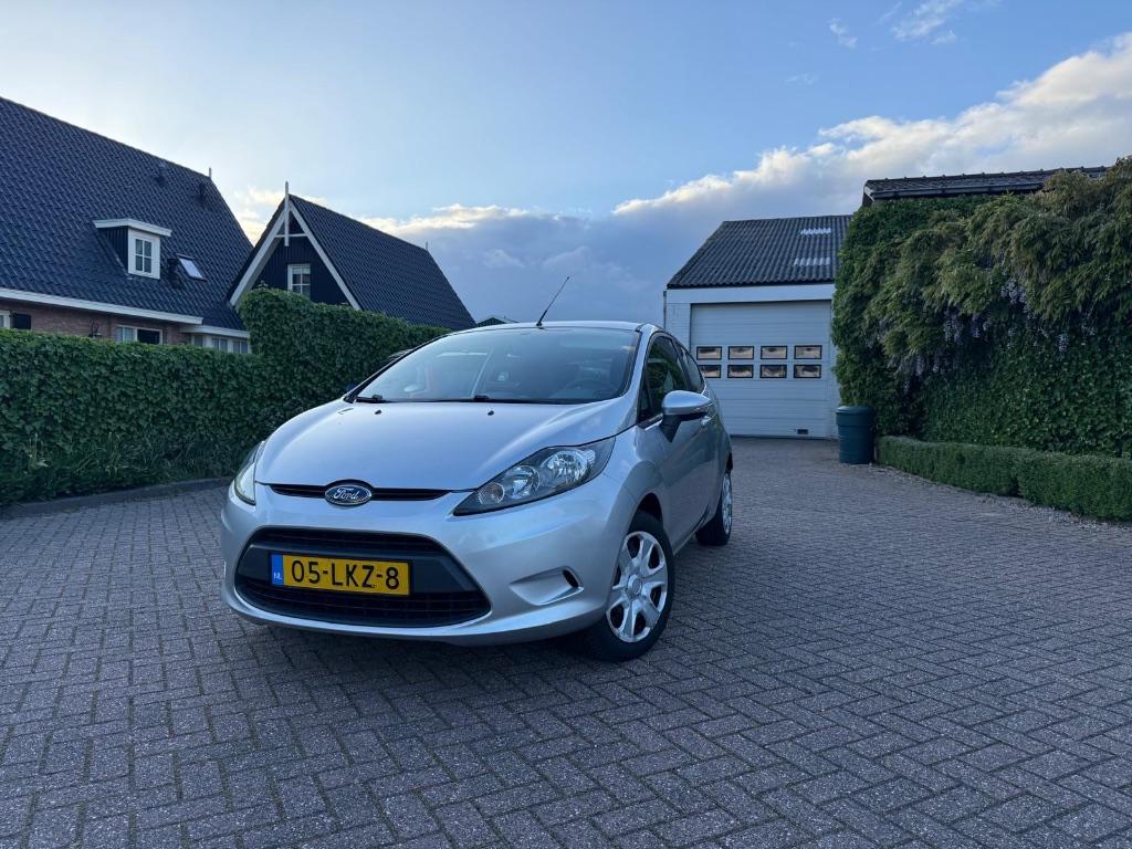 Ford Fiësta 1.25 Limited 44KW 3DR 2010 Grijs Airco CarPlay, Voorwielaandrijving, 4 cilinders, Origineel Nederlands, Handgeschakeld