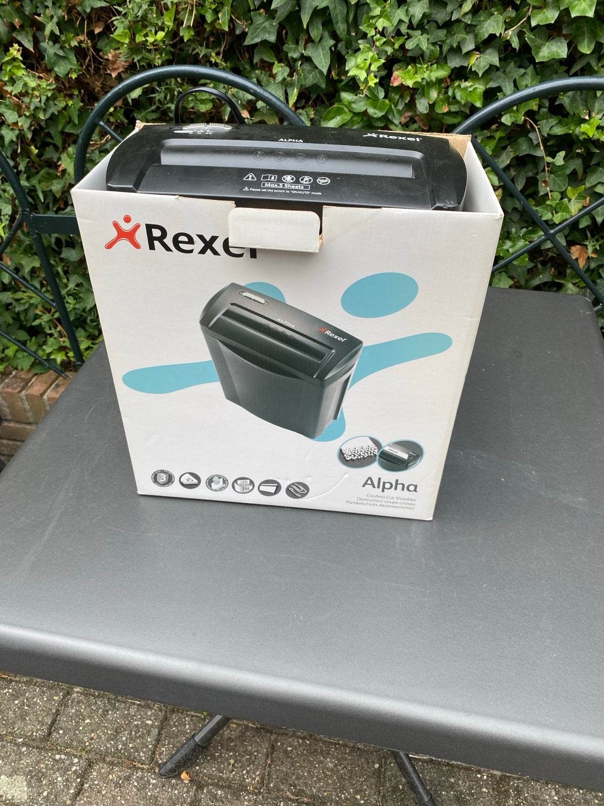 Rexel Alpha papiervernietiger, Ophalen