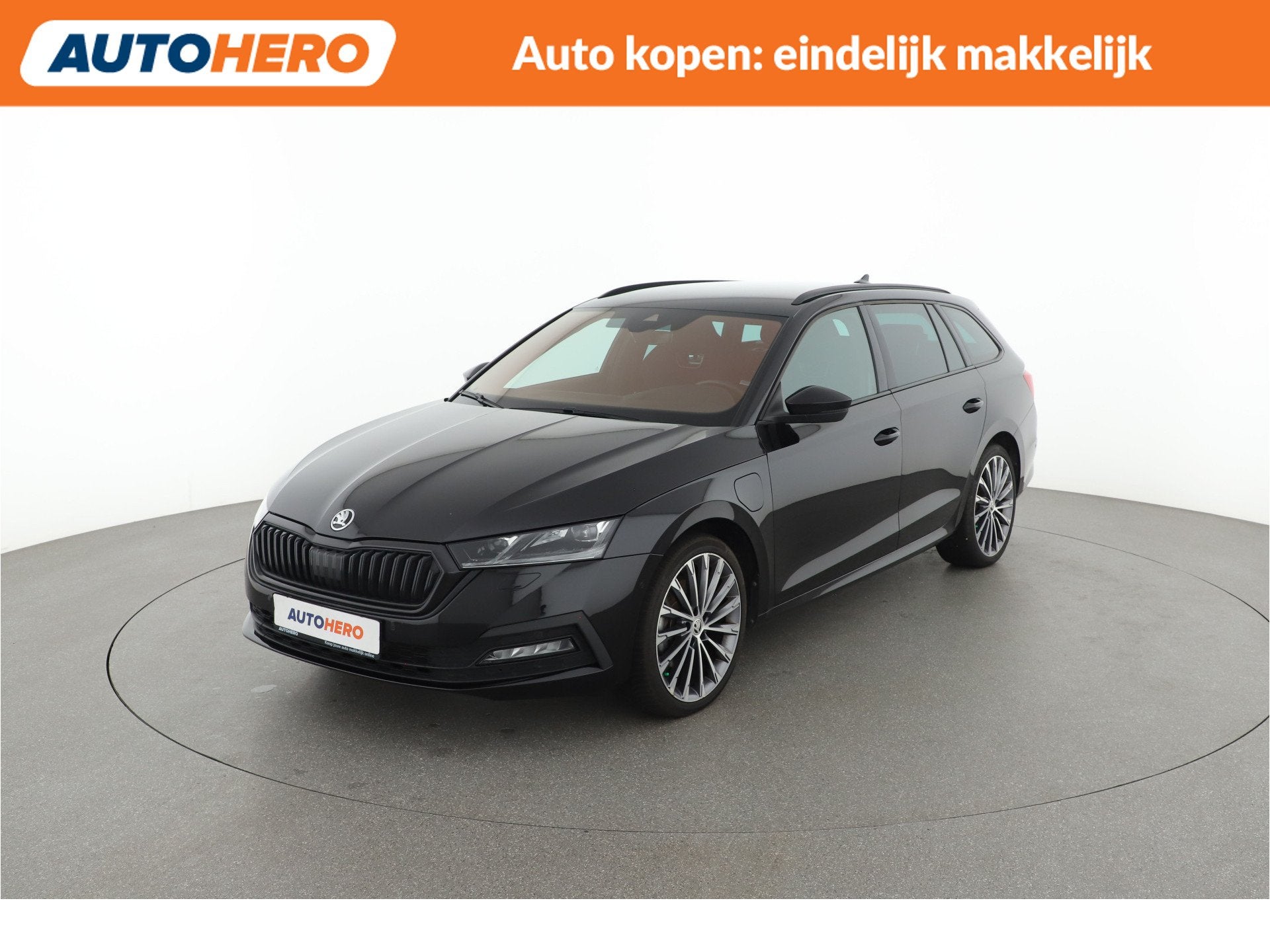 Skoda Octavia Combi 1.4 TSI iV PHEV Business Edition | KZ899, Auto's, Stof, Gebruikt, Zwart, Plug-in hybride