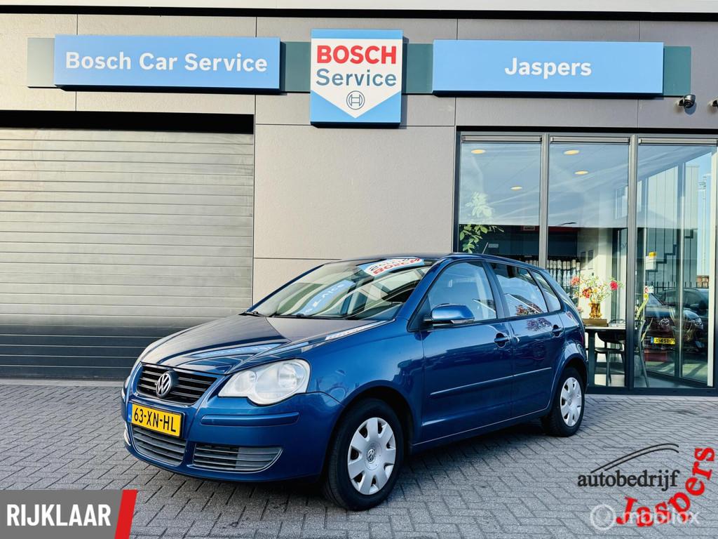 Volkswagen Polo 1.4-16V Optive, Auto's, Gebruikt, 4 cilinders, Blauw, Bedrijf