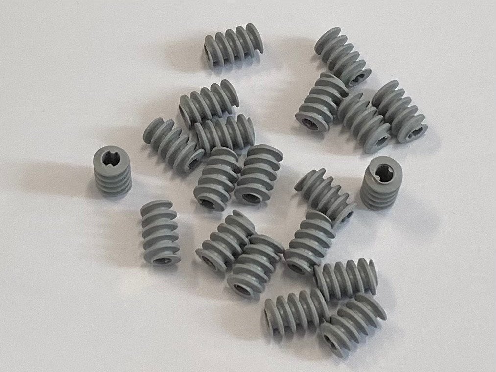 Partij 20x nieuwe lichtgrijze Lego Technic worm wielen