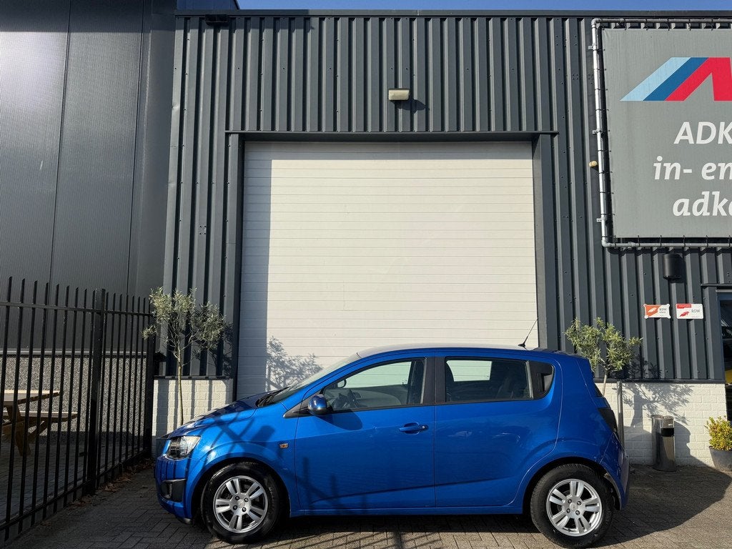 Chevrolet Aveo 1.4 LT AUTOMAAT/STOELVERW/AIRCO/ELEK PAKKET, Auto's, Chevrolet, Euro 5, Gebruikt, 4 cilinders, Blauw