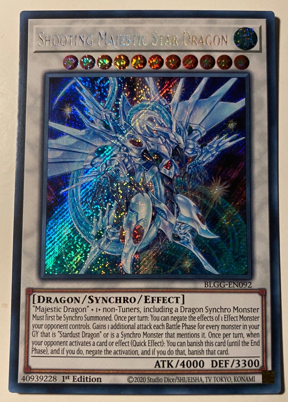 Yu-Gi-Oh! Shooting Majestic Star Dragon BLGG 1st Edition !, Ophalen of Verzenden, Zo goed als nieuw, Losse kaart, Foil