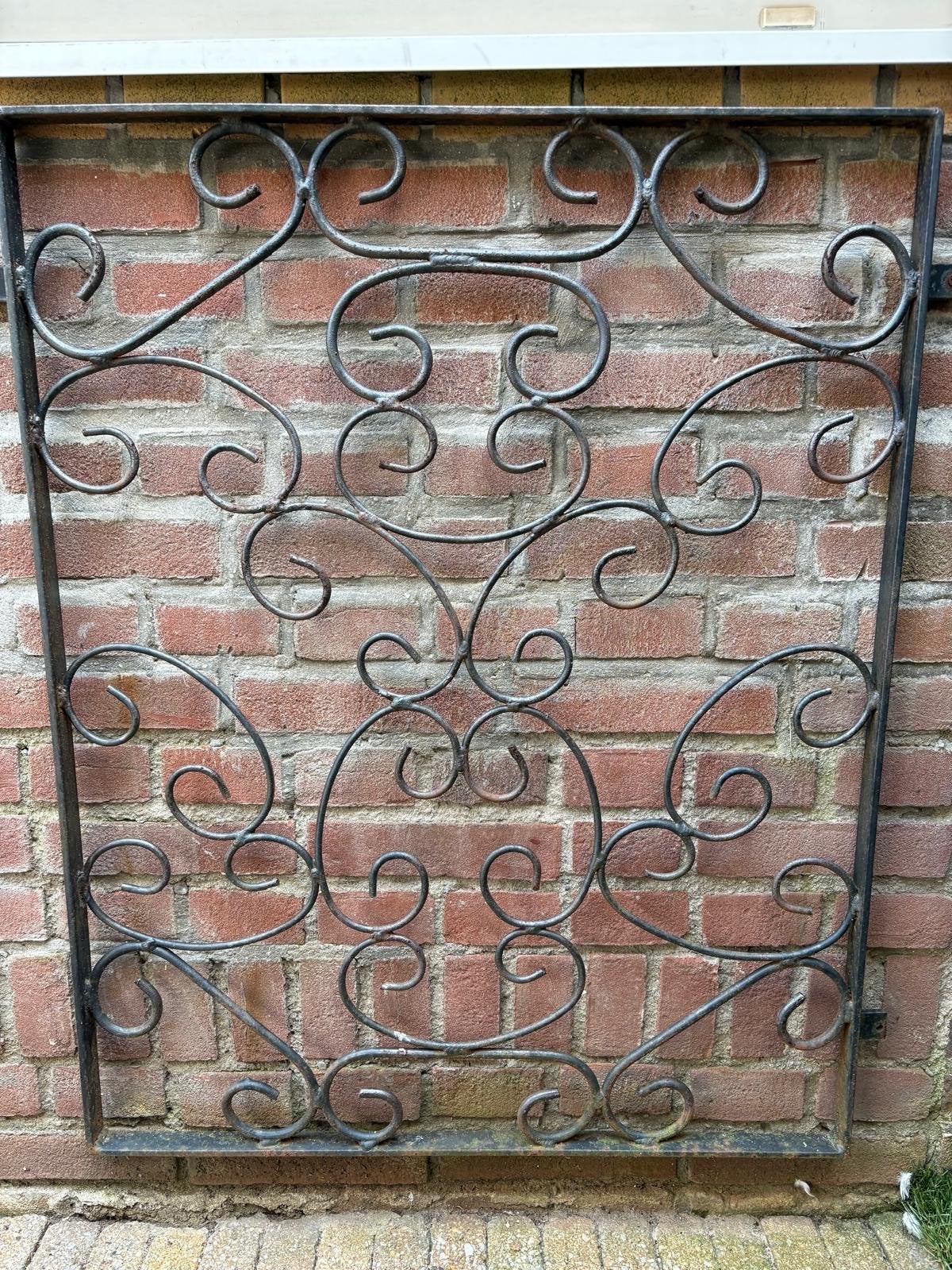 Decoratief smeedijzeren hekwerk / raamrooster, Ophalen of Verzenden, Gebruikt, IJzer, Overige typen