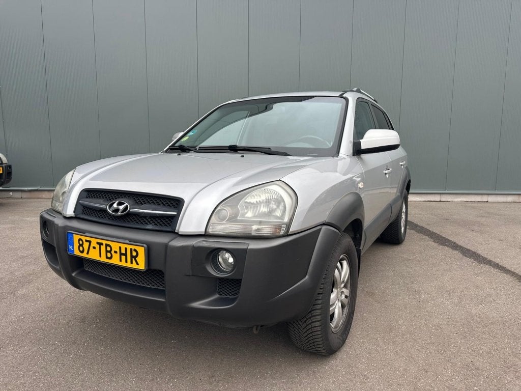Hyundai Tucson 2.0i Style LEDER | CLIMA | TREKHAAK !, Auto's, 142 pk, 4 cilinders, Origineel Nederlands, Handgeschakeld