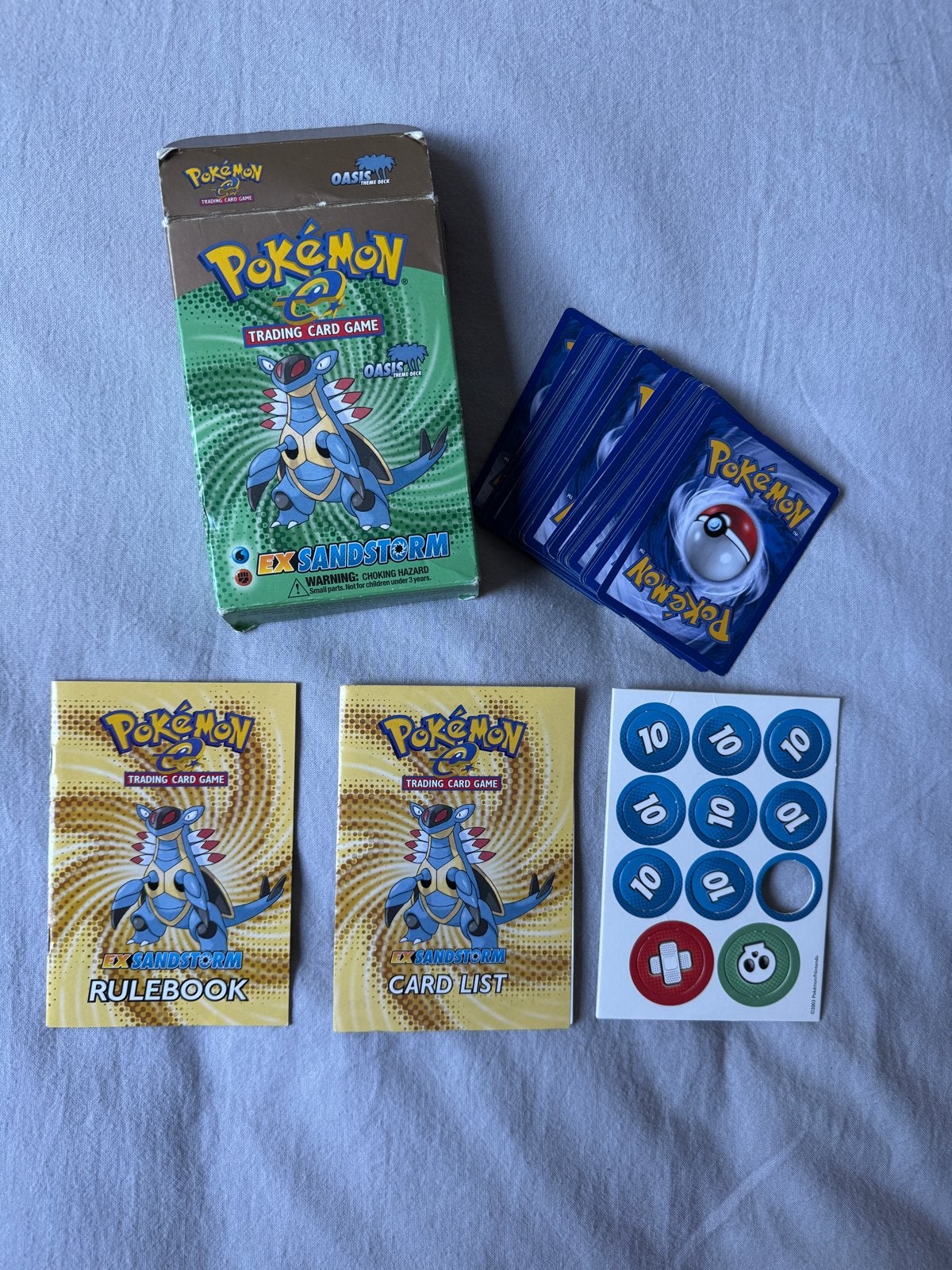 Pokemon The Oasis Theme Deck EX Sandstorm incl munt & boekje, Ophalen of Verzenden, Gebruikt, Speeldeck