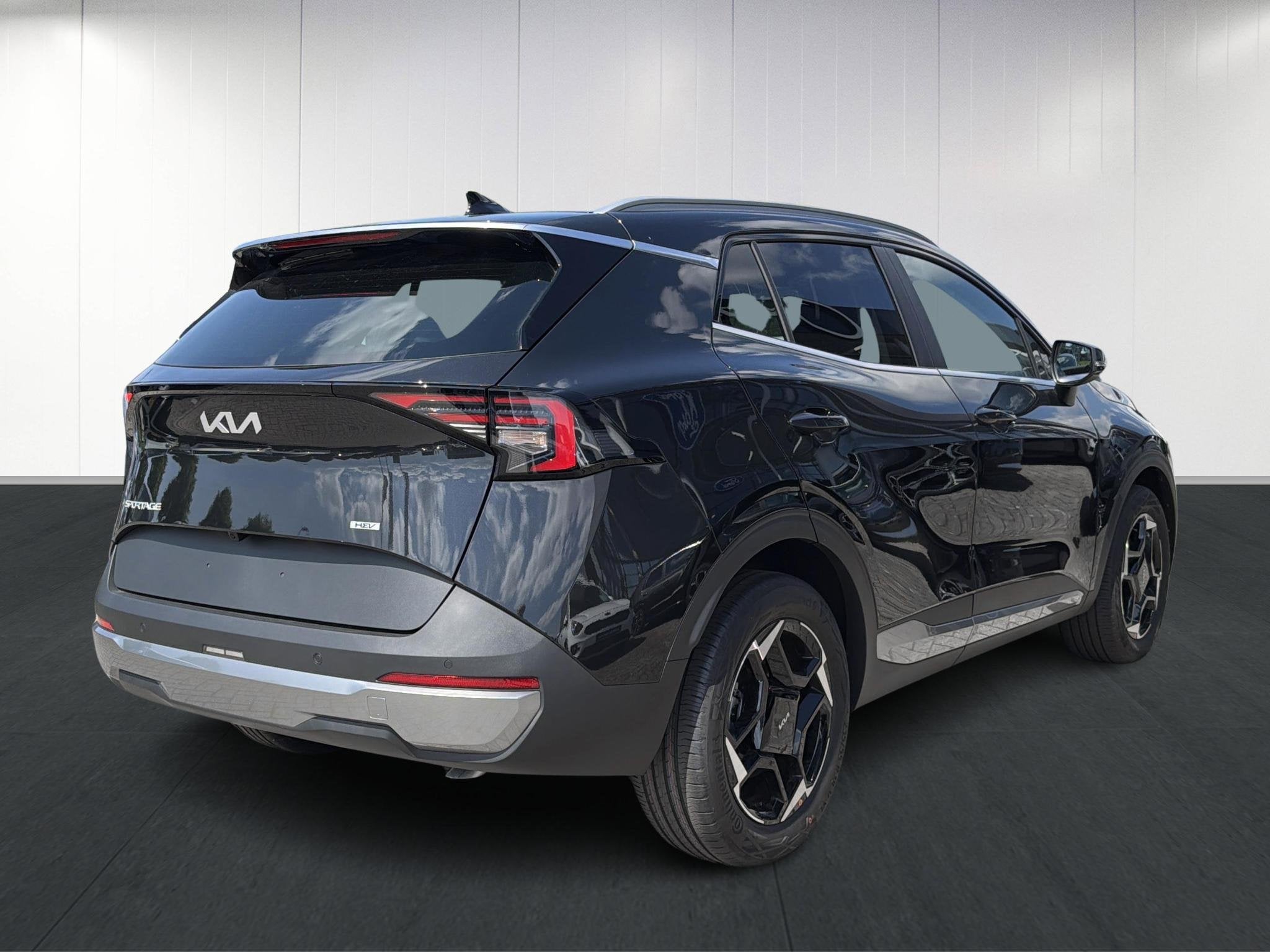Kia Sportage 1.6 T-GDi Hybrid DynamicLine | Stuurwielverwarm, Auto's, 4 cilinders, Leder en Stof, Zwart, Hybride Elektrisch/Benzine