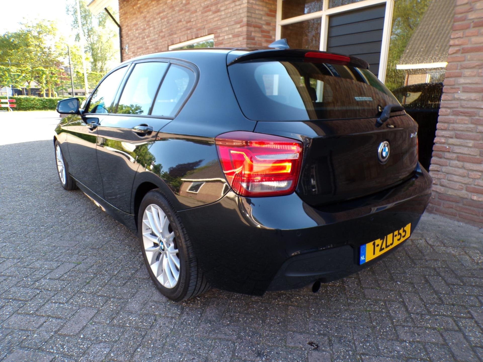 BMW 1-serie 114i EDE Executive M Pakket, Auto's, 1-Serie, Dealer onderhouden, Gebruikt, Euro 6