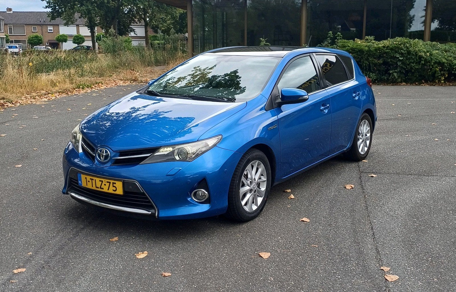Toyota Auris 1.8 Hybrid 73KW 5D 2014 Blauw LPG-G3, Auto's, Toyota, Stof, Zwart, Blauw, Navigatiesysteem