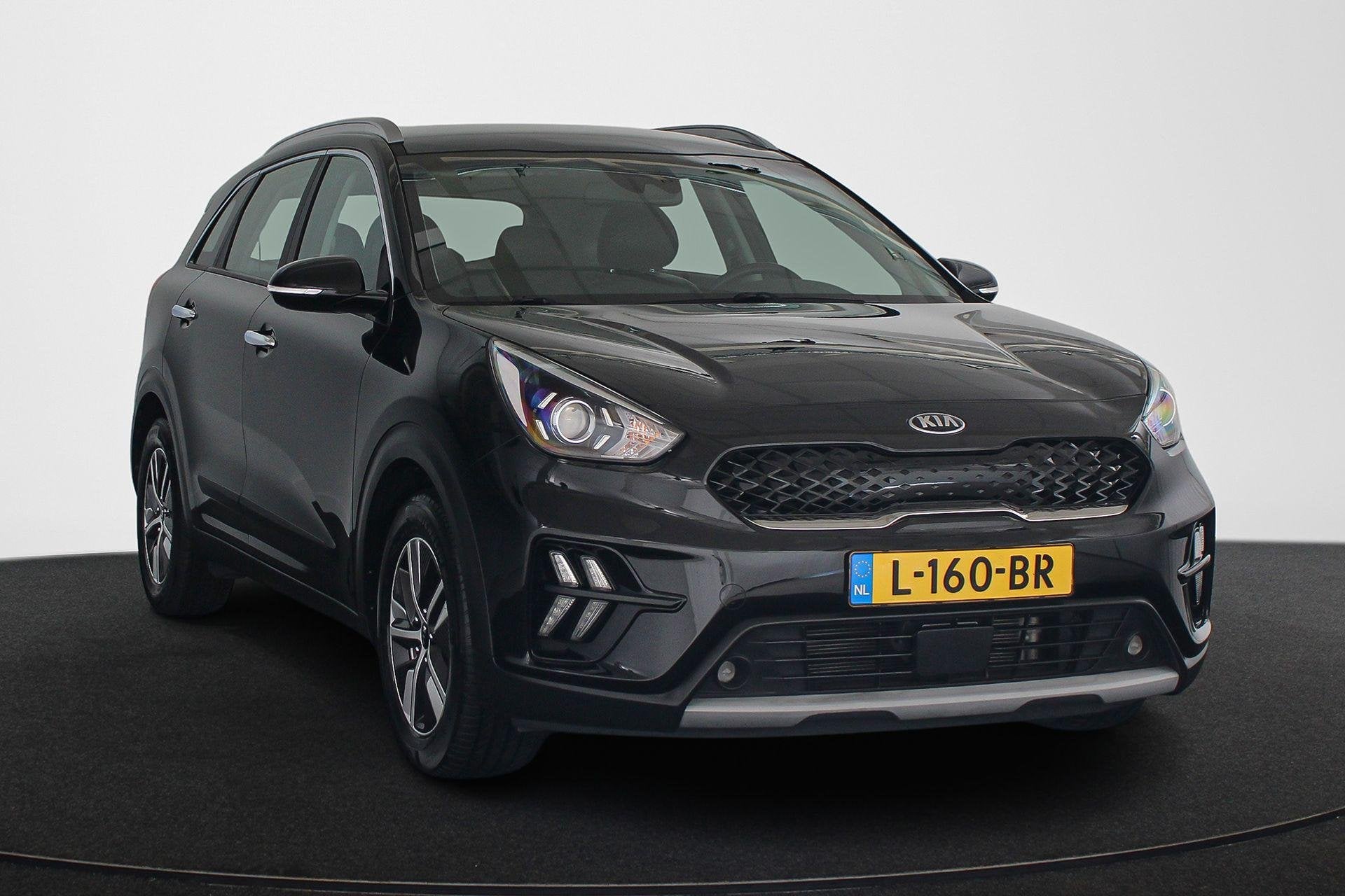 Kia Niro 1.6 GDi Hybrid DynamicLine Apple CarPlay Achteruitr, Auto's, Gebruikt, 2 kWh, Leder en Stof, Zwart
