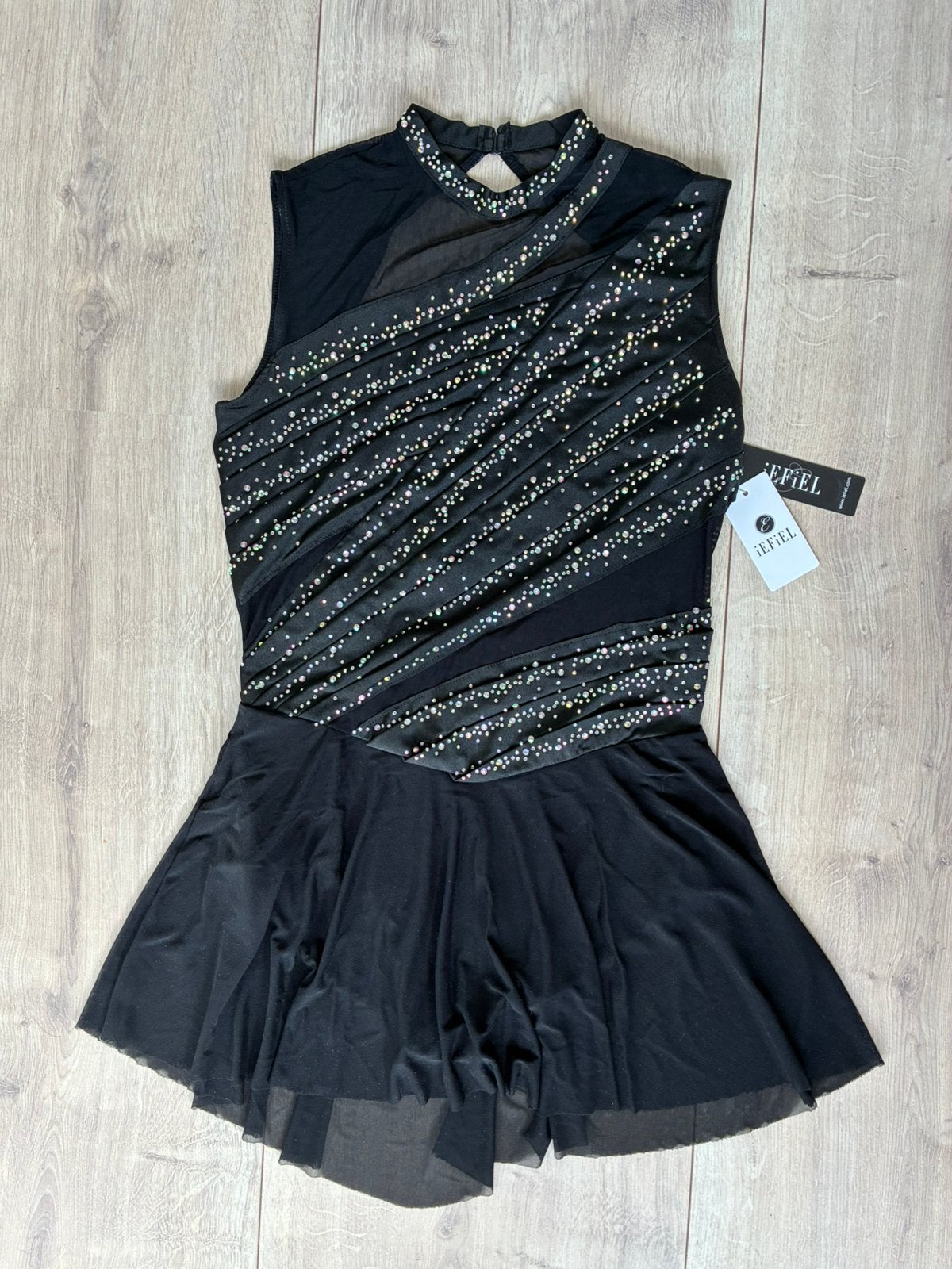 Kunstschaatspakje zwart damesmaat M, Ophalen of Verzenden, Nieuw, Kleding