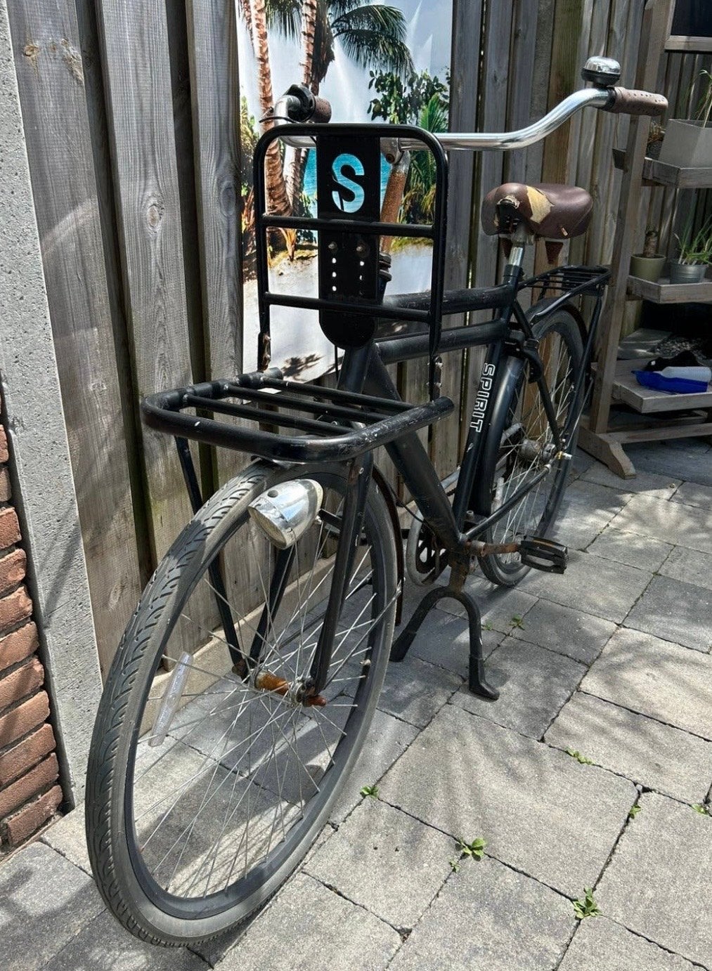 Zwarte herenfiets met gebruikssporen, Terugtraprem, Gebruikt, Versnellingen, Ophalen