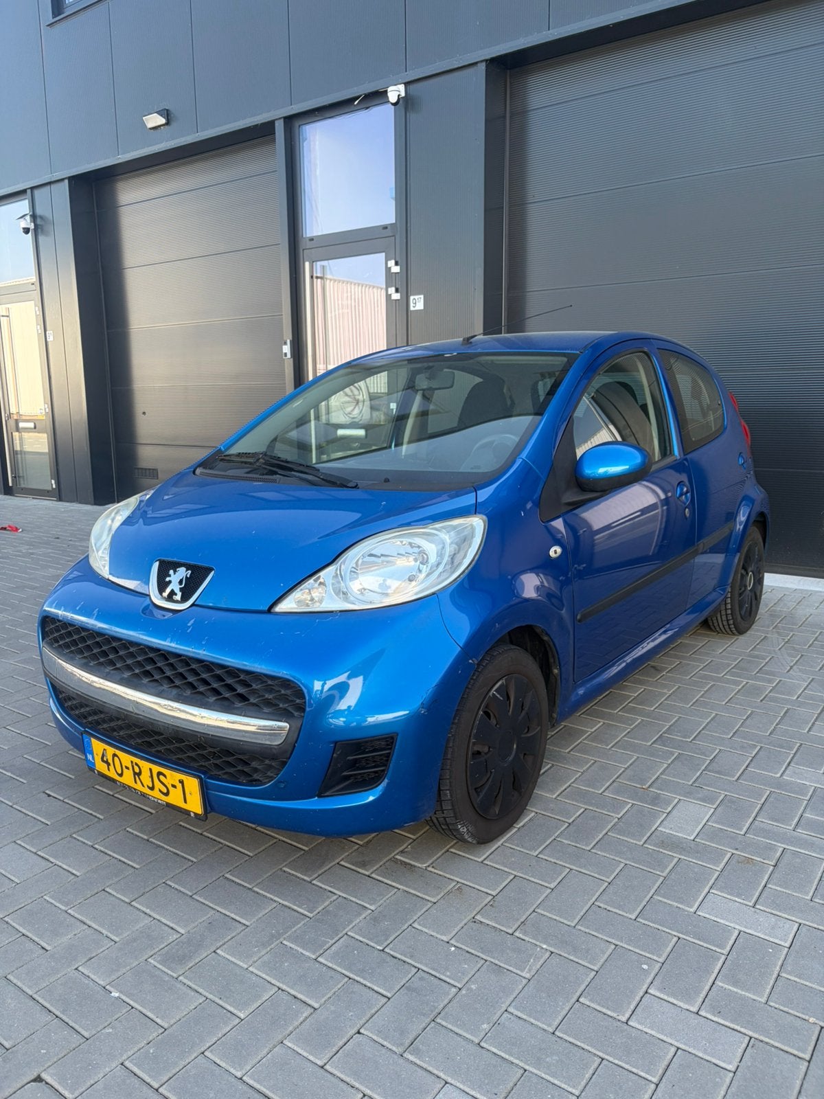 Peugeot 107 1.0 12V 5DR 2011 Blauw, Auto's, Voorwielaandrijving, 68 pk, Origineel Nederlands, Bedrijf