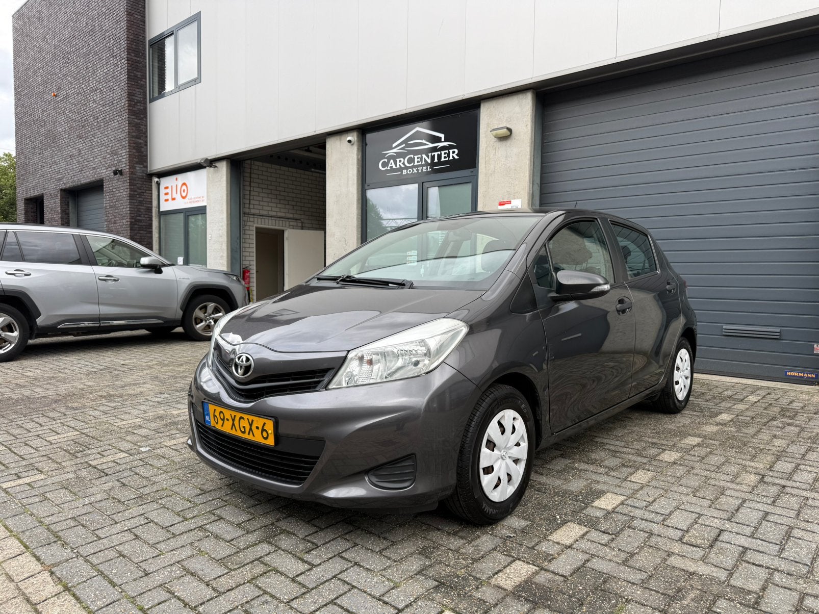 Toyota Yaris 1.0 12V Vvt-i 5DR 2012 Grijs, Origineel Nederlands, Bedrijf, Handgeschakeld, 3 cilinders