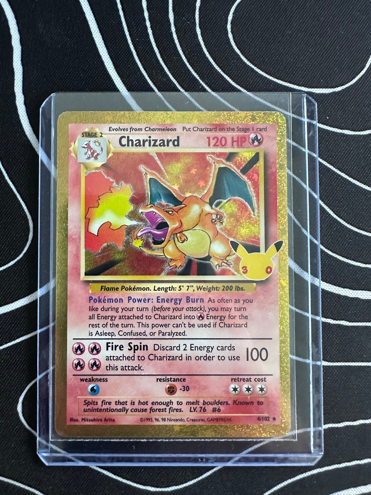 30th anniversary Charizard Pokémon kaart 4/102, Ophalen of Verzenden, Gebruikt, Losse kaart