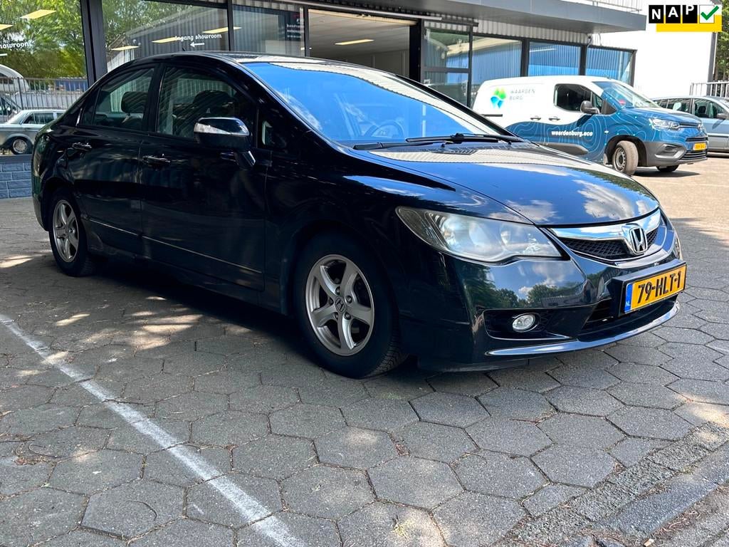 Honda Civic 1.3 Hybrid/Automaat/Airco/, Auto's, Gebruikt, Metallic lak, Zwart, Origineel Nederlands