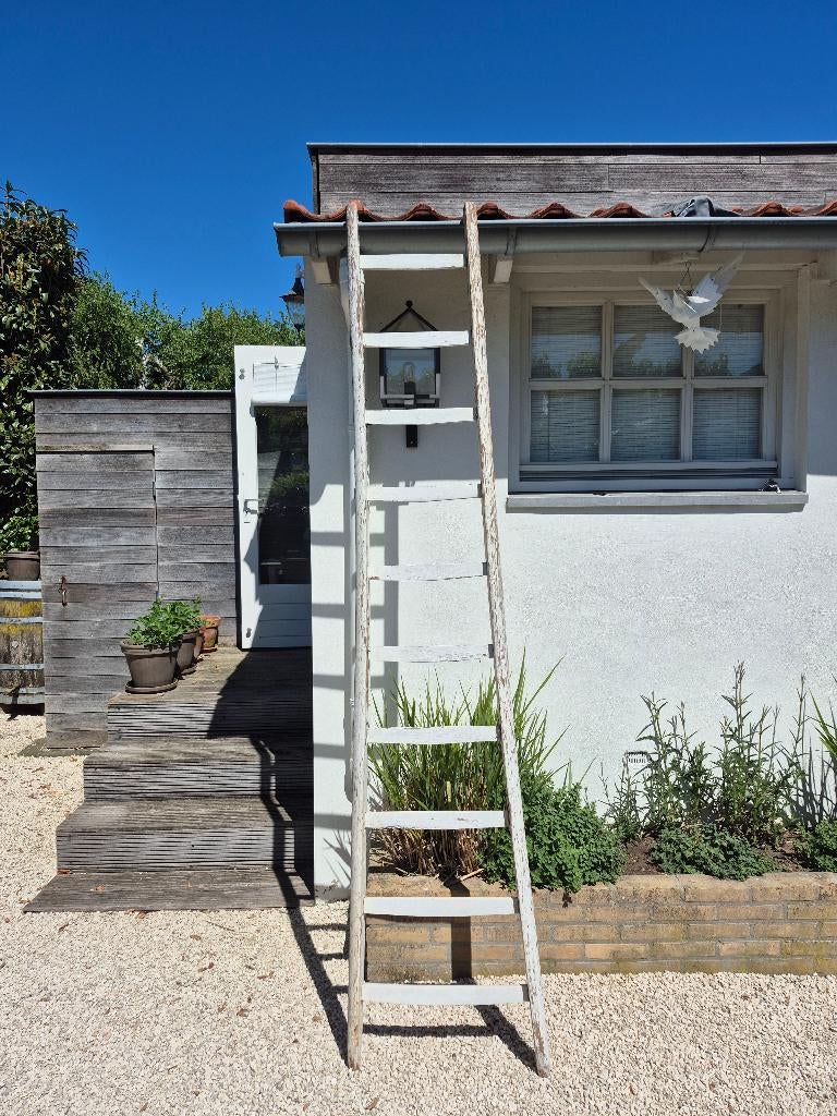 Decoratieve oude fruitladder, Ophalen