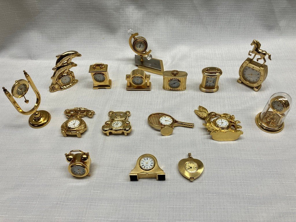 15 quartz miniatuurklokjes + 1 Ancre 17 ca. 1970-2000, Antiek en Kunst, Verzenden