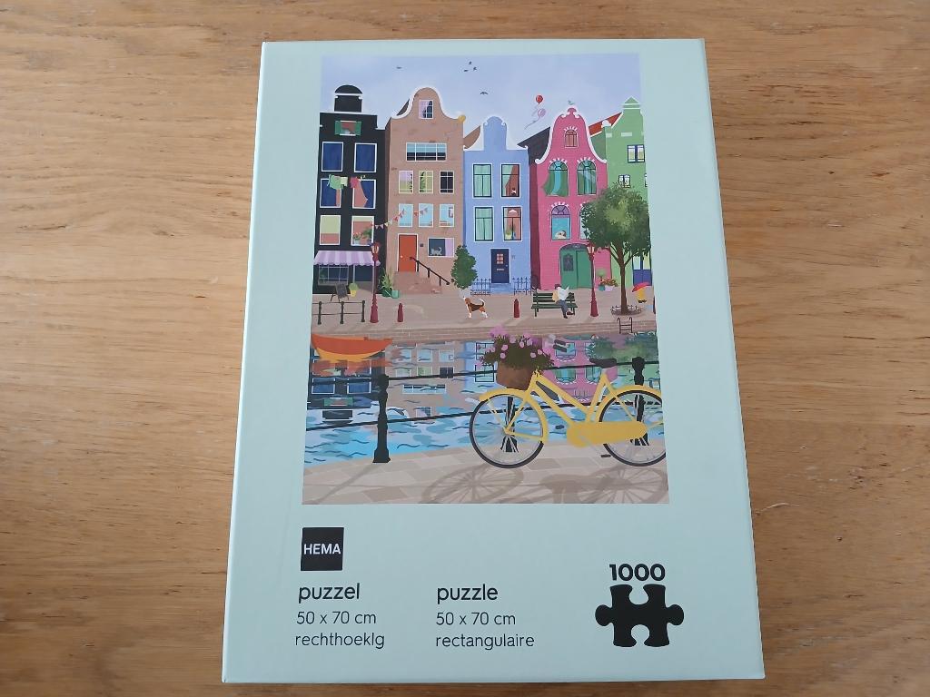 Puzzel Grachtenpanden Hema. 1000 stukjes. Nieuw, Ophalen of Verzenden, 500 t/m 1500 stukjes, Nieuw, Legpuzzel