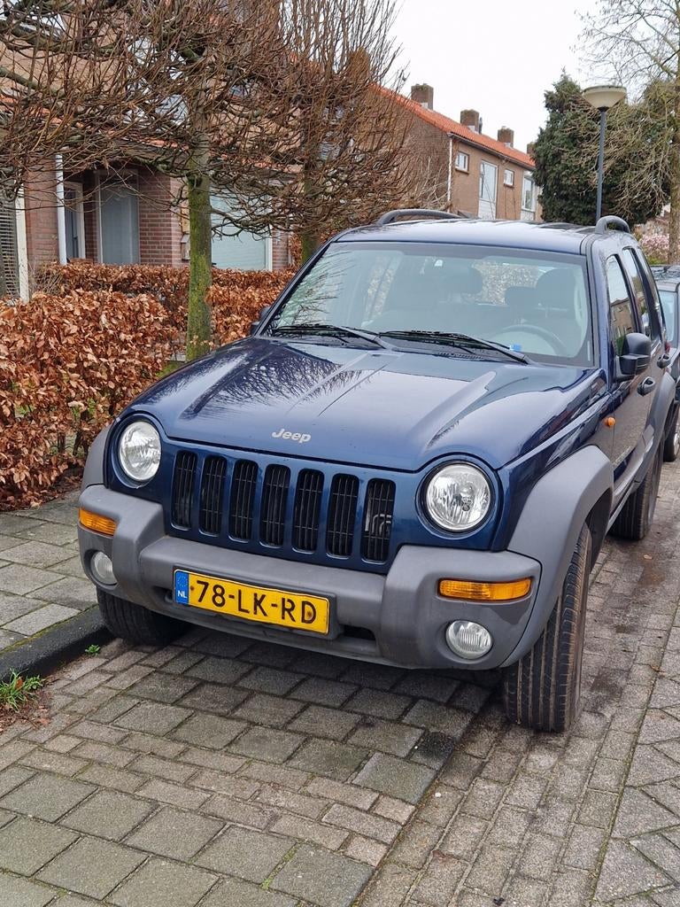 Jeep Cherokee 4x4 Sport, Auto's, Stof, Blauw, 3960 cc, Handgeschakeld
