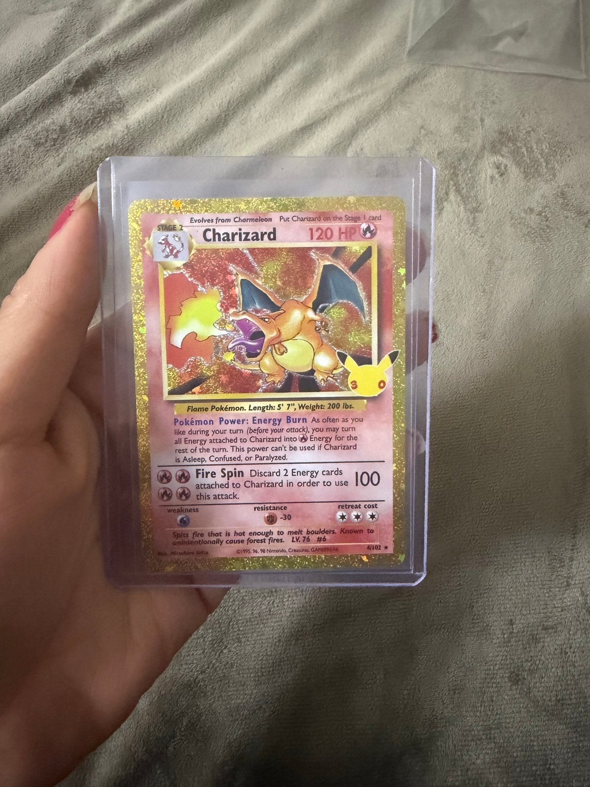 Charizard 4/102 30th Celebration Pokémon kaart, Ophalen of Verzenden, Zo goed als nieuw, Losse kaart, Foil