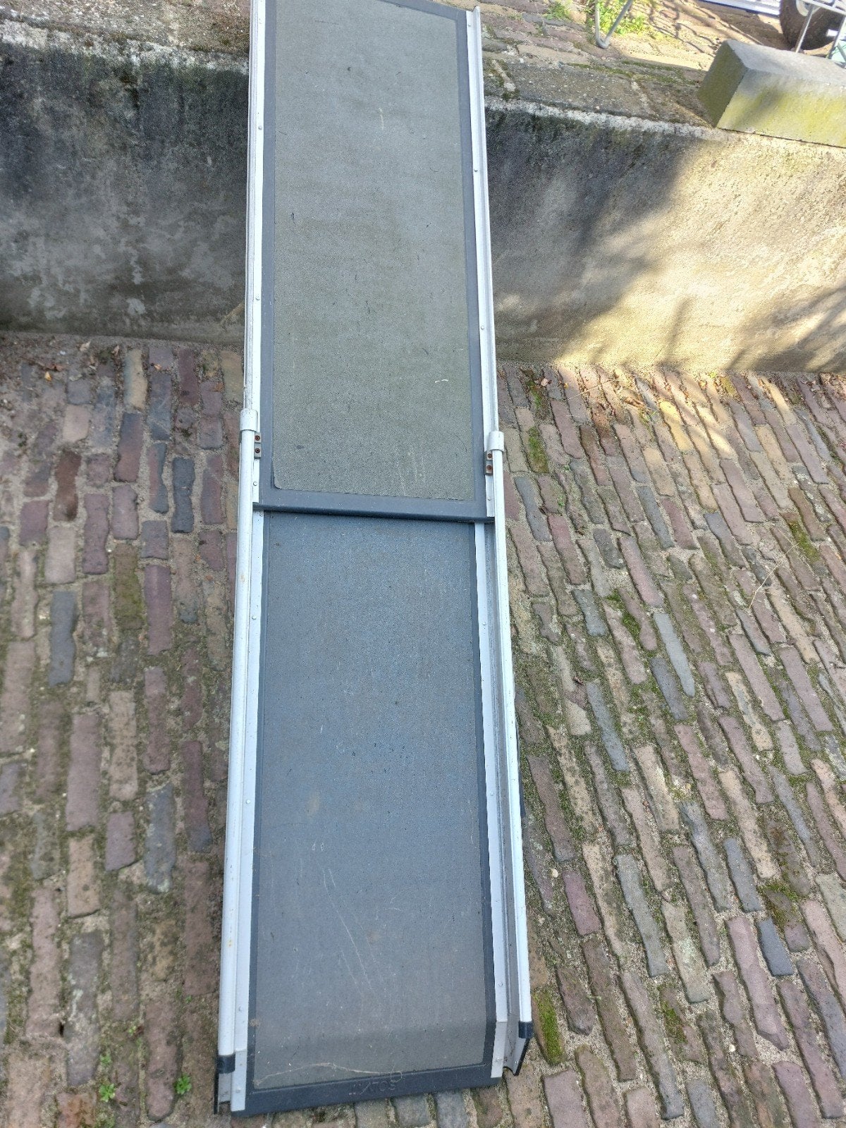 honden loopplank, Ophalen